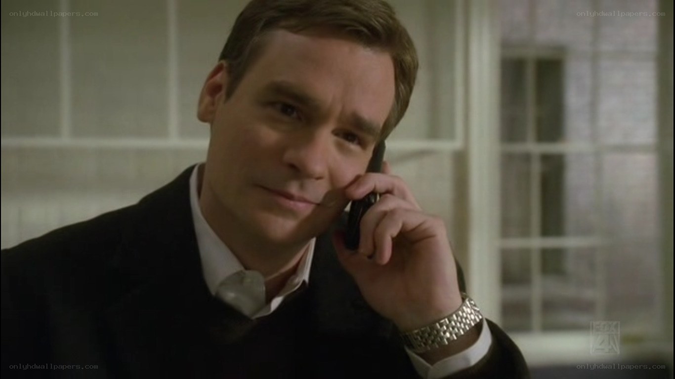 man on phone in suit