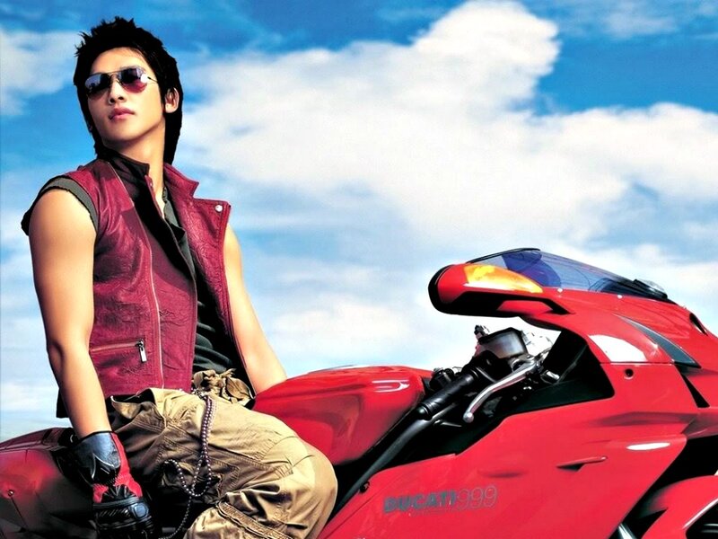 Man on Red Motorcycle — Confident