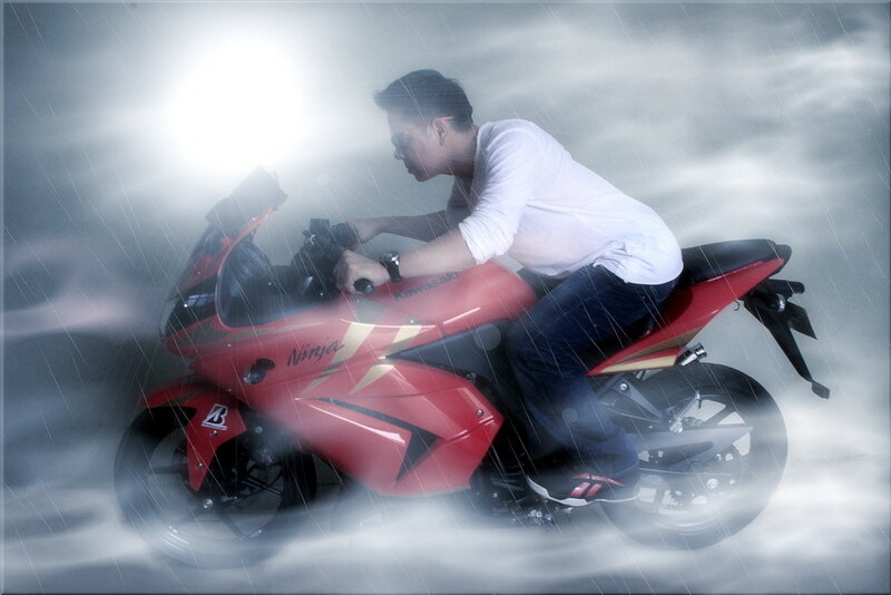 Man on Red Motorcycle — Dramatic