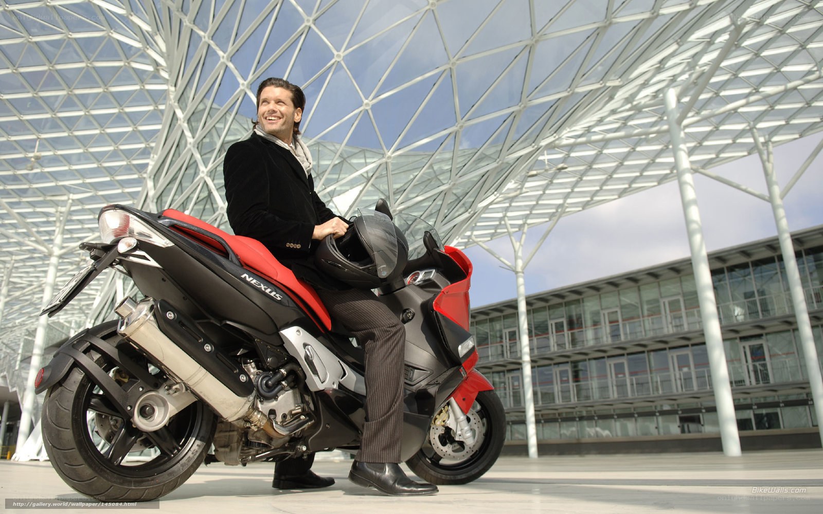 Man on red motorcycle