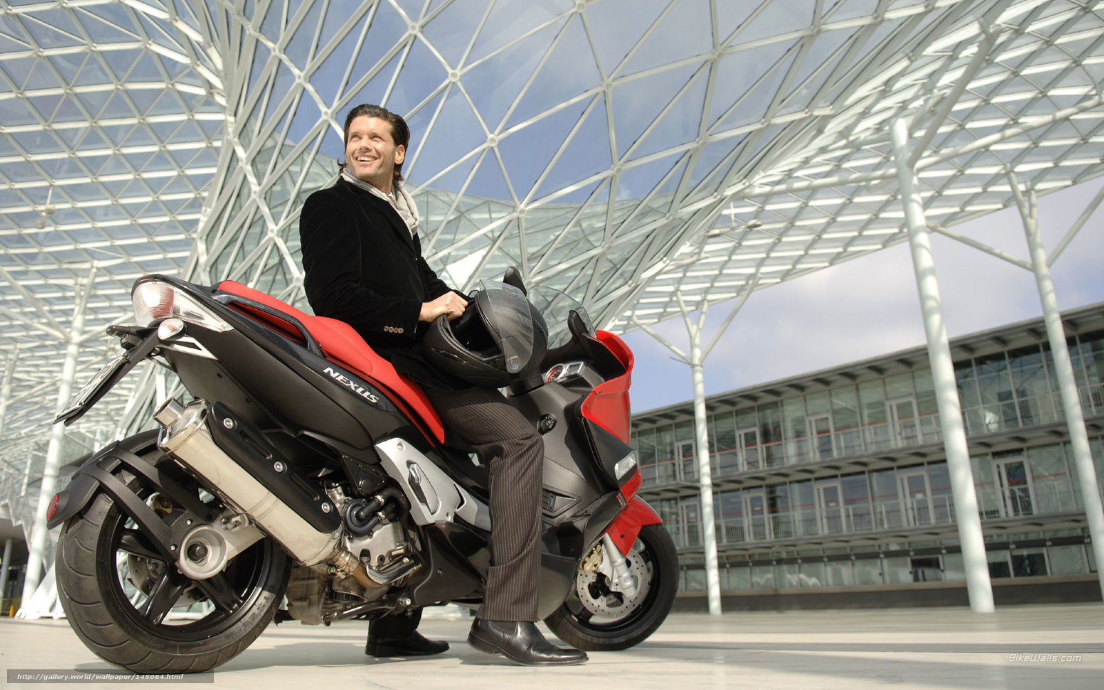 Man on red motorcycle