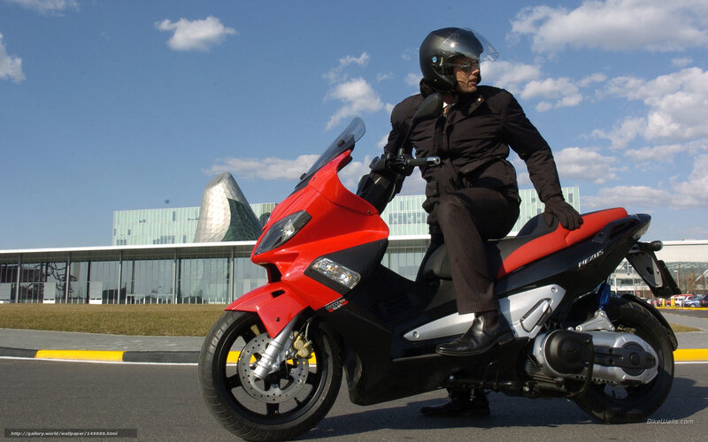 Man on Red Scooter — Outdoor