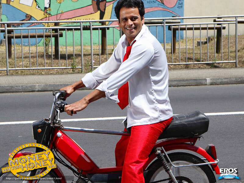 Man on red scooter