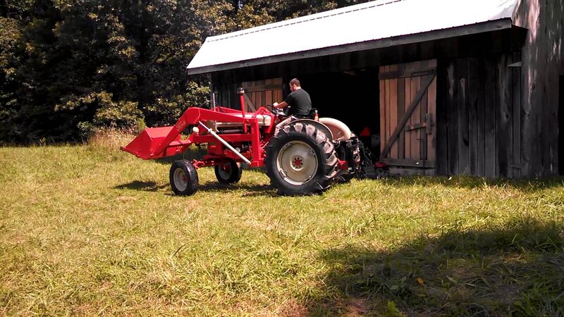 Man on Red Tractor