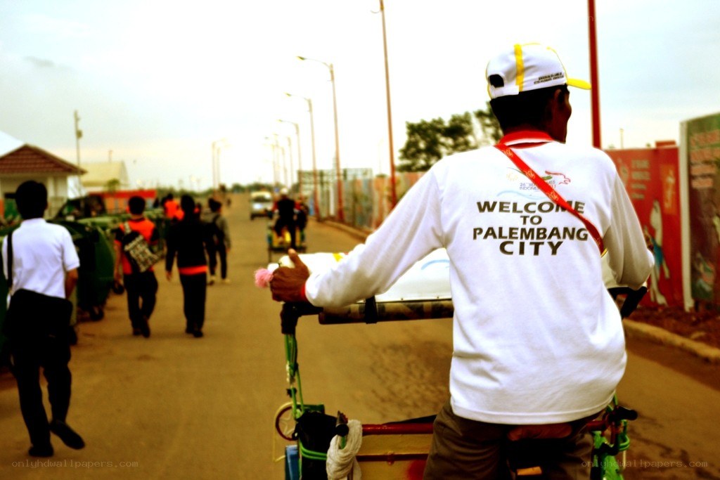 Man on rickshaw in Palembang
