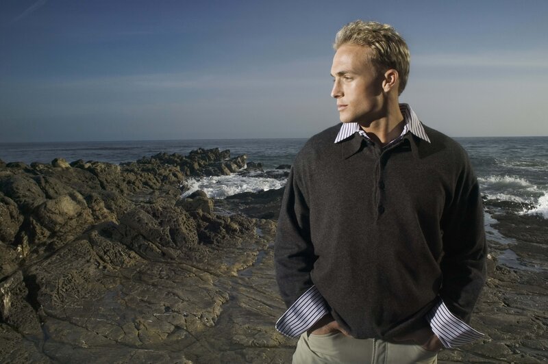 Man on Rocky Shore — Blue, Serene, Afternoon