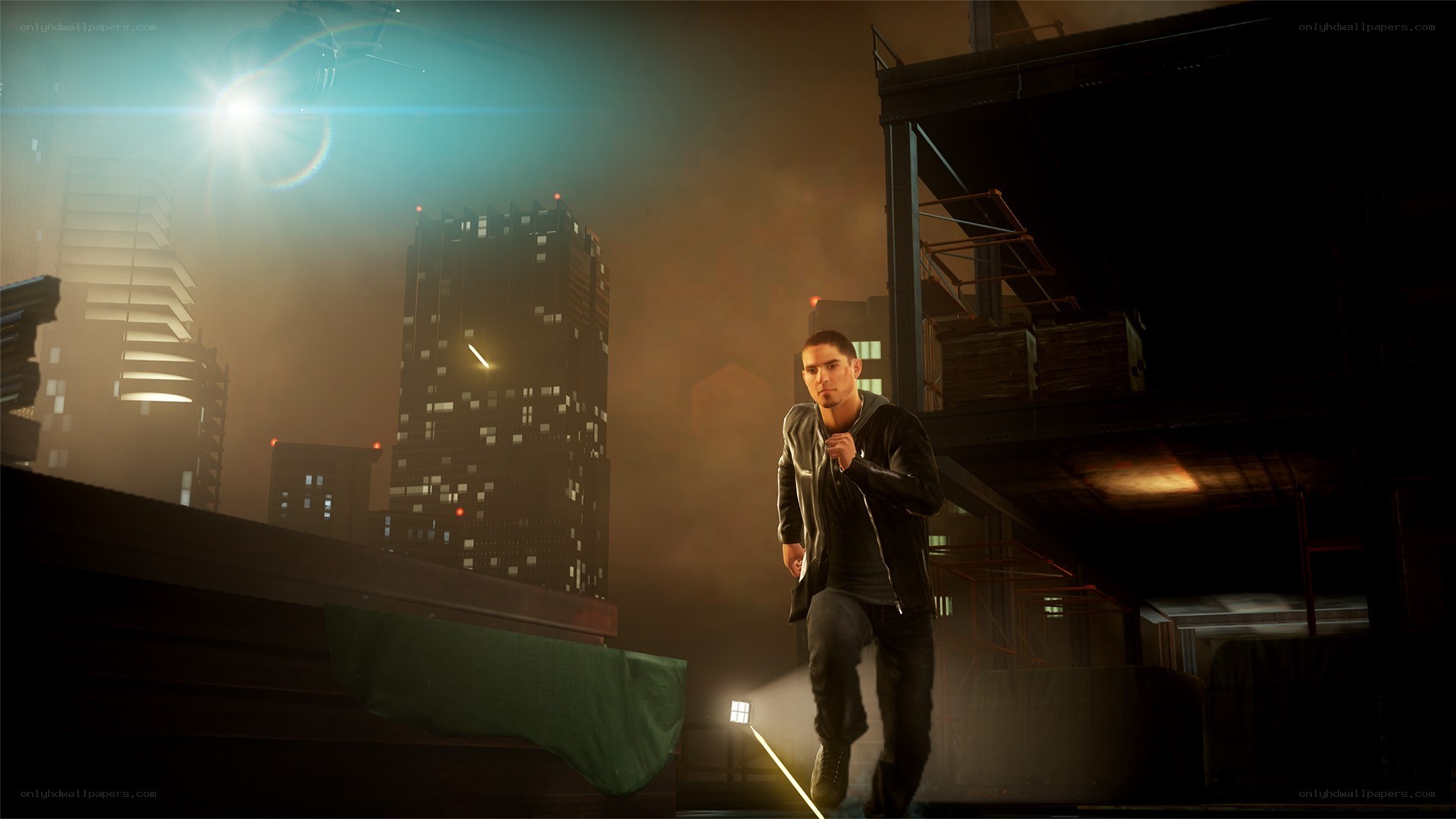 man on rooftop at night