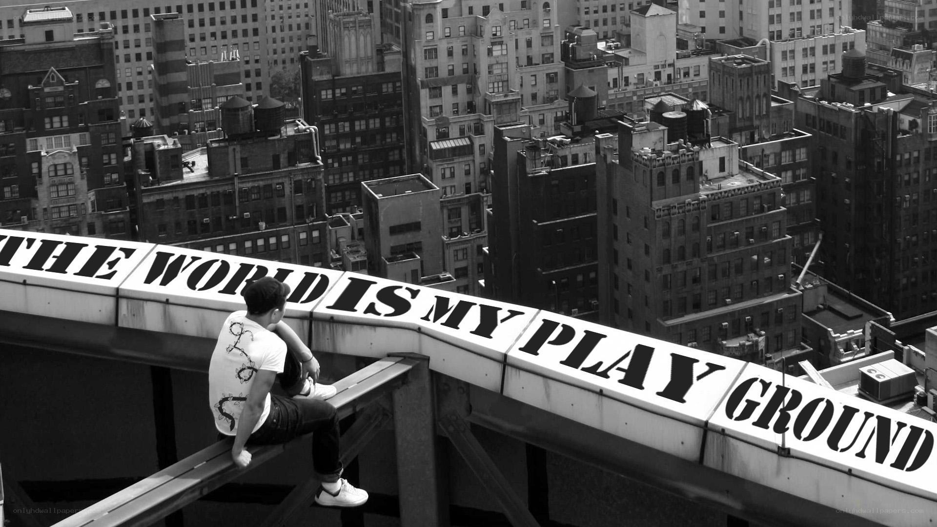 man on rooftop with sign
