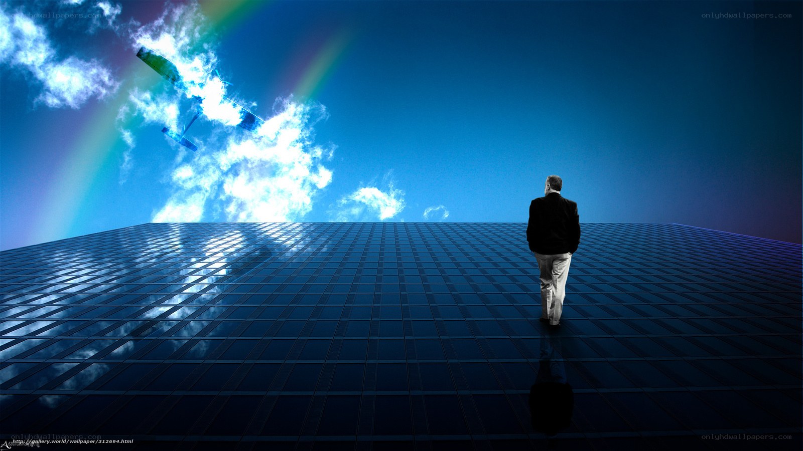 Man on skyscraper roof