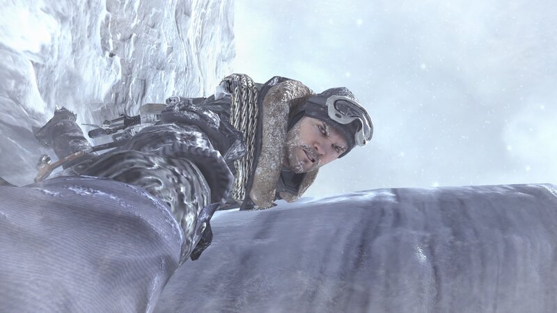 man on snowy cliff edge