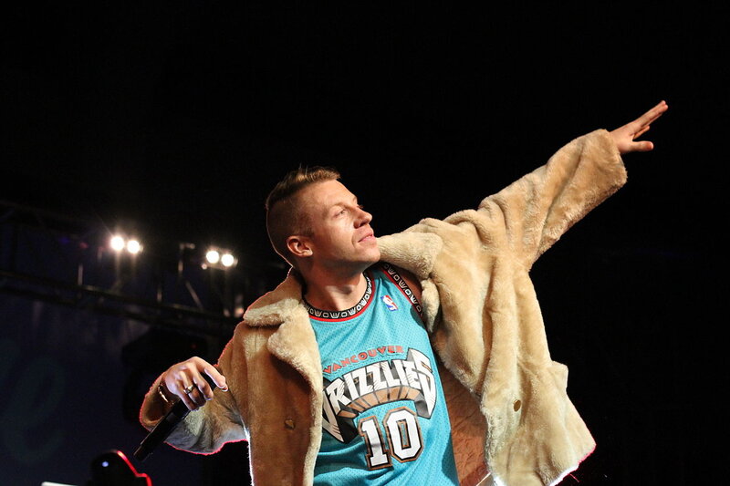 Man on Stage Performing — Black, Energetic