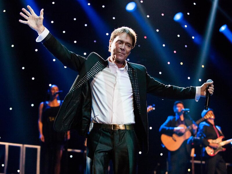 Man on Stage Singing — Black, Dramatic