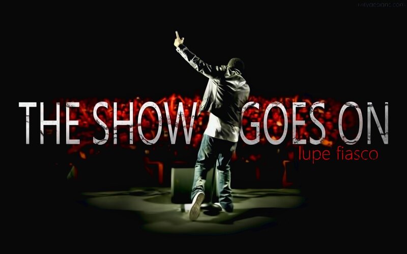 Man on Stage with Microphone — Black