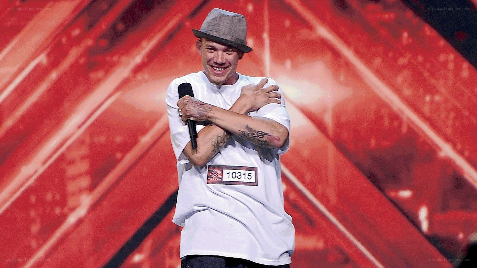Man on stage with microphone