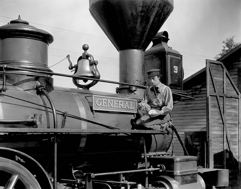 Man on steam locomotive