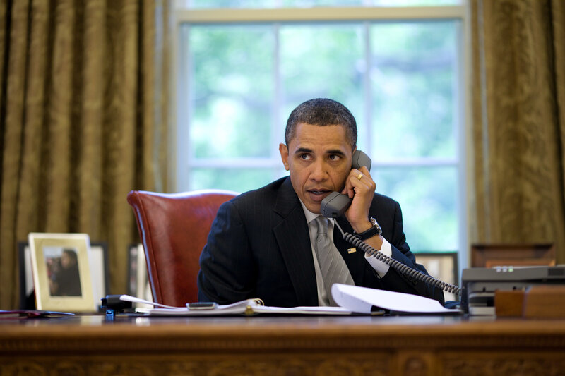 Man on Telephone — Brown