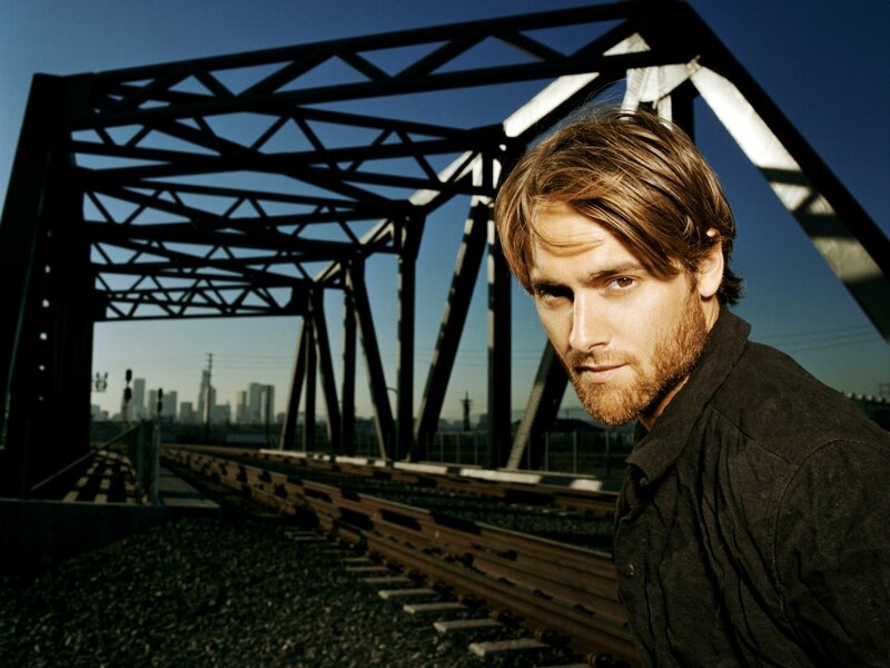 man on train bridge