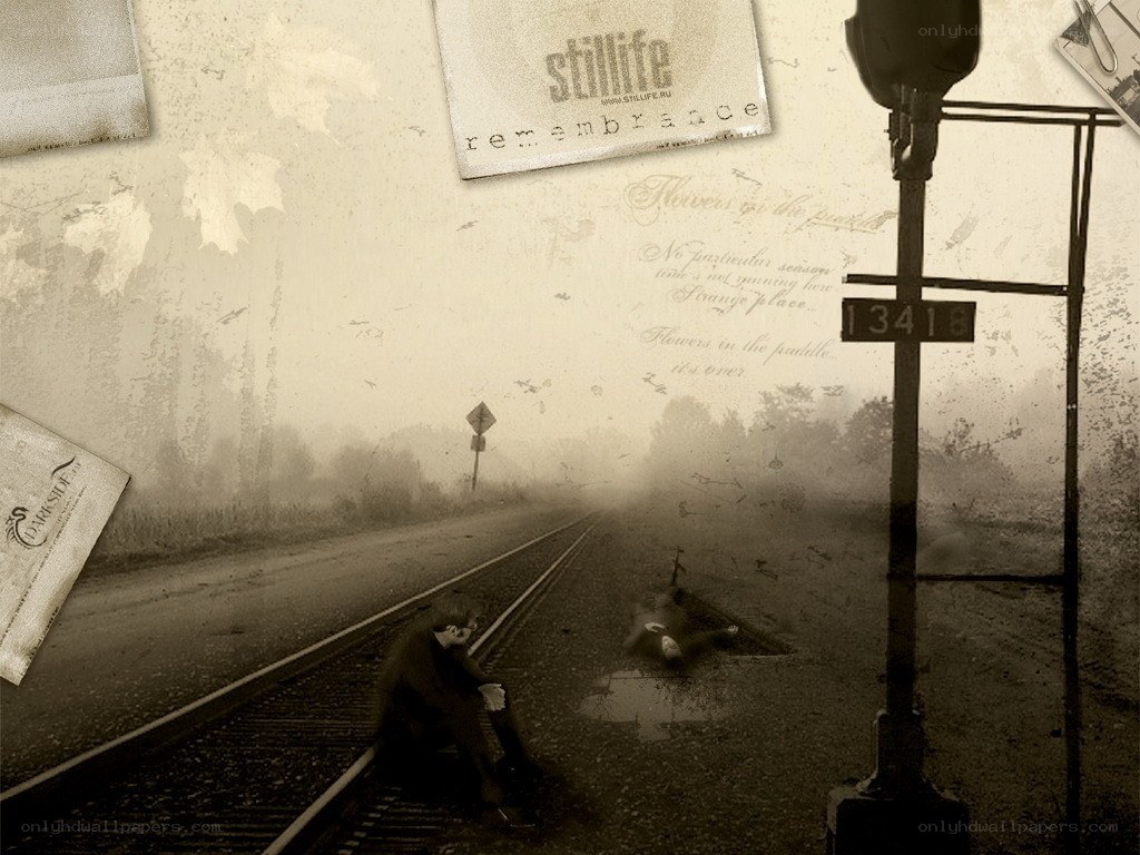 Man on train tracks in fog