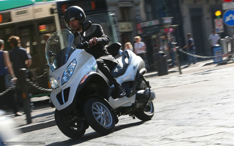 Man on White Scooter