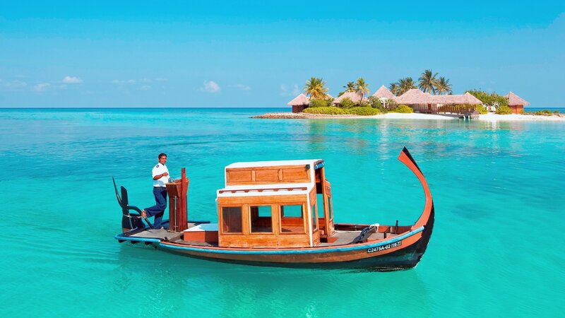 Man on Wooden Boat — Blue