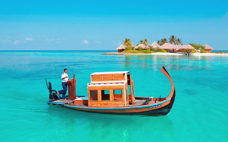 Man on Wooden Boat