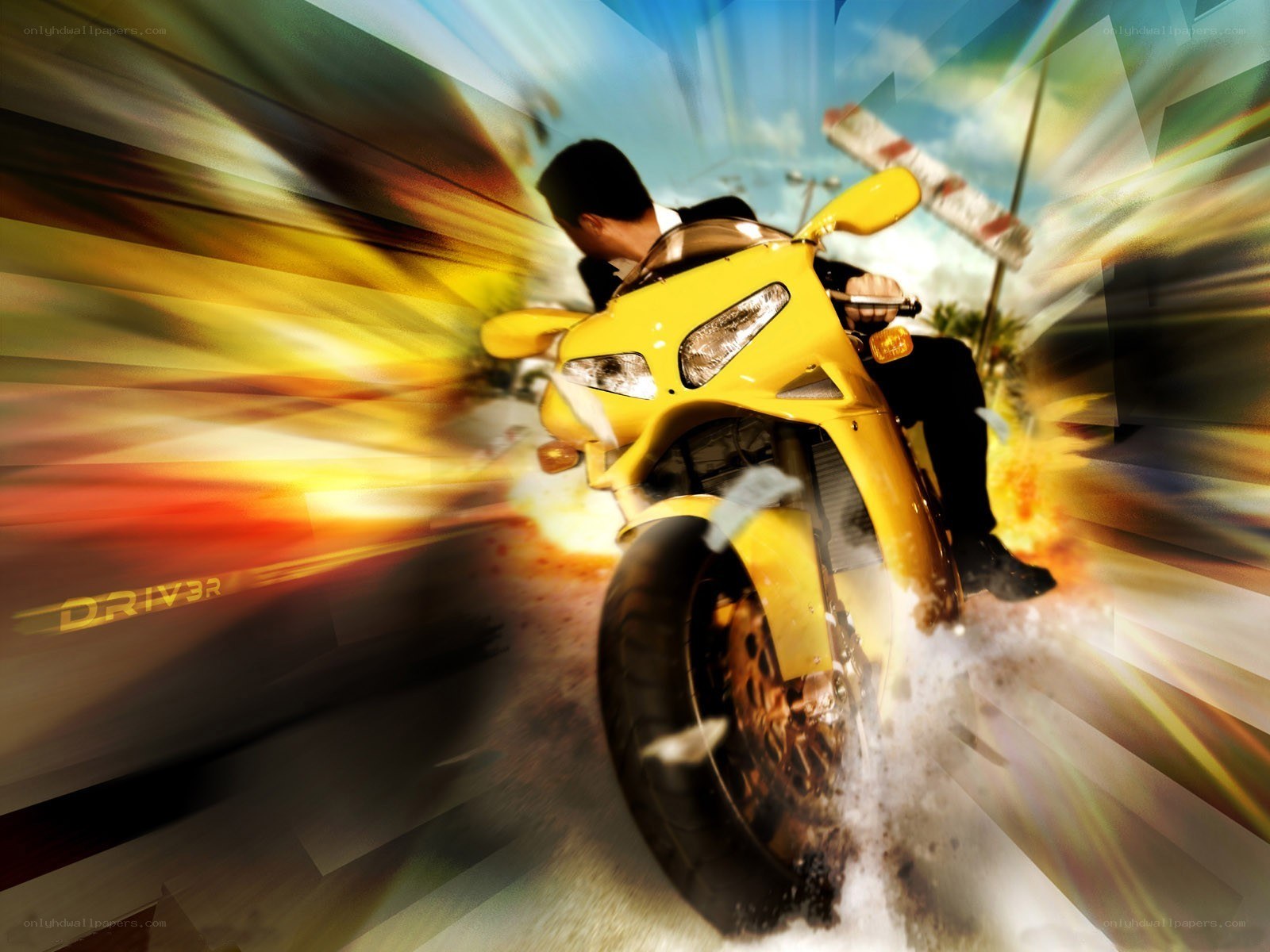 Man on yellow motorcycle in motion