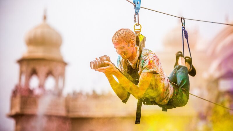 Man on Zipline with Camera — Yellow