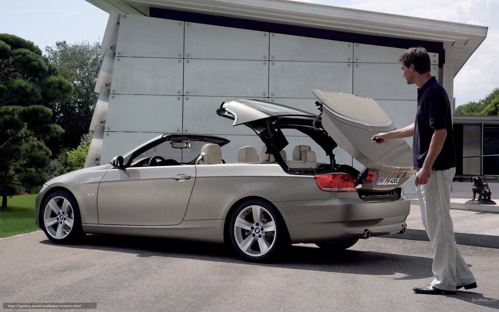 Man opening car trunk