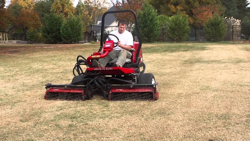 Man Operating Lawn Mower