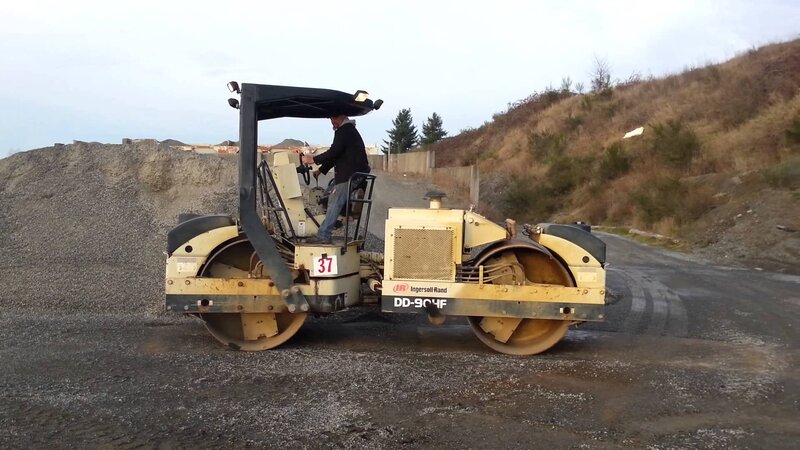 Man Operating Road Roller