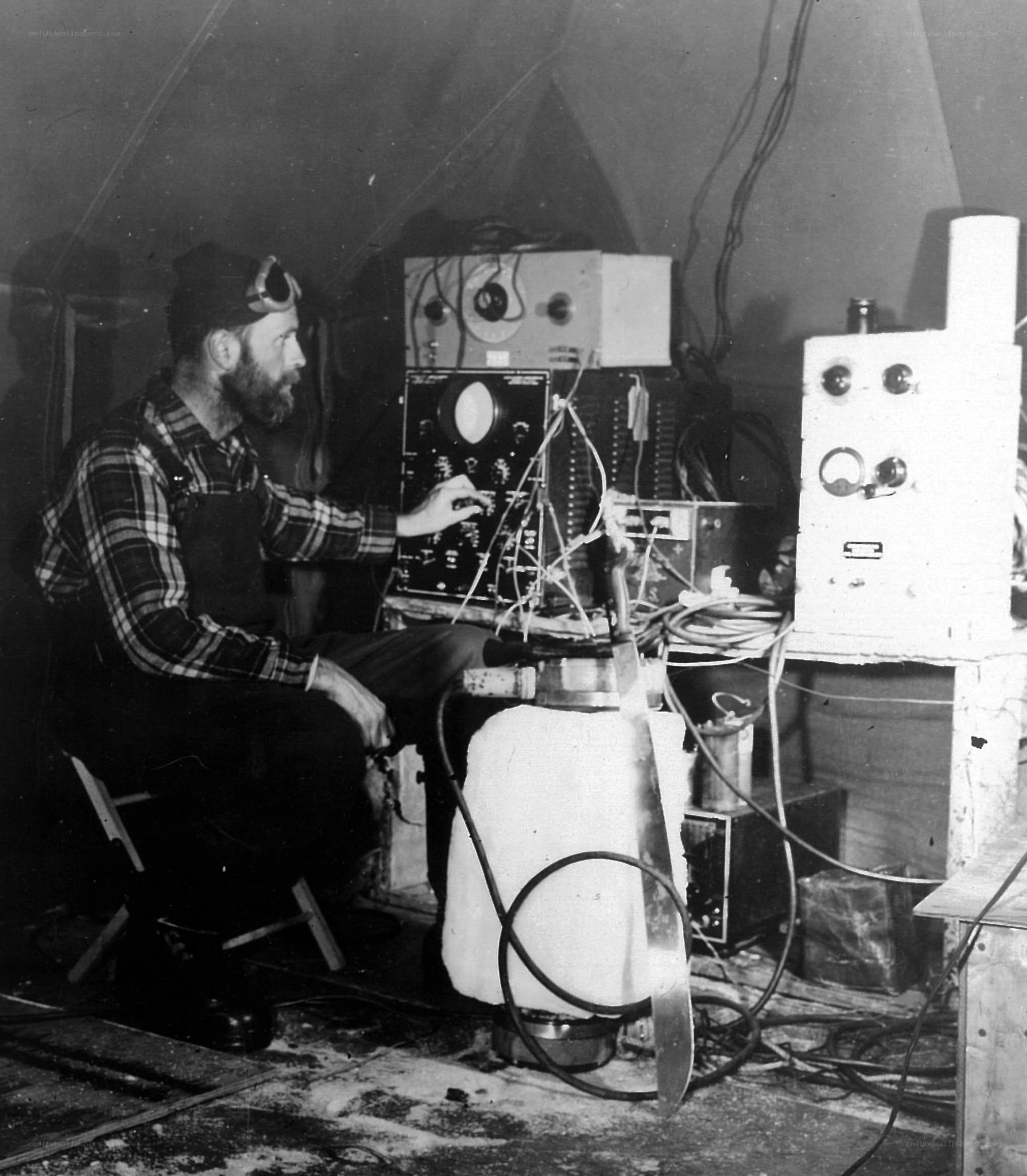 Man operating scientific equipment