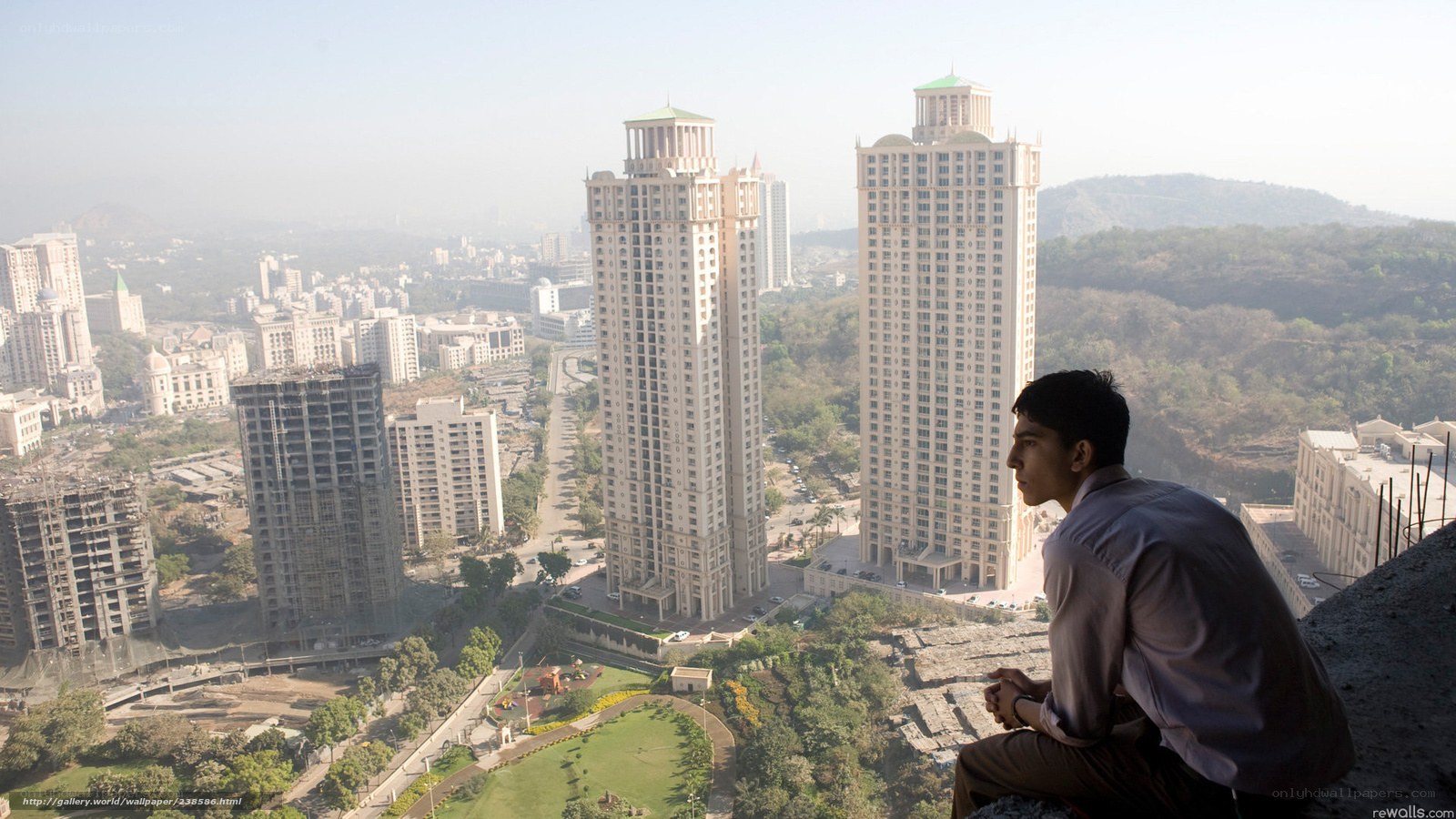Man overlooking cityscape