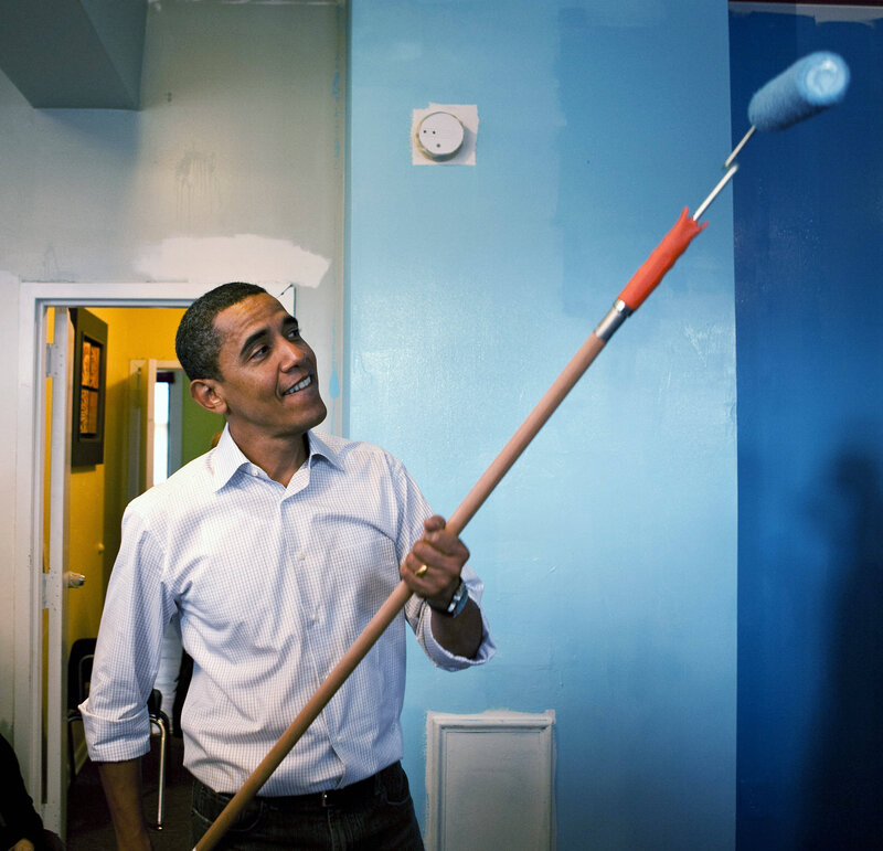 Man Painting a Wall
