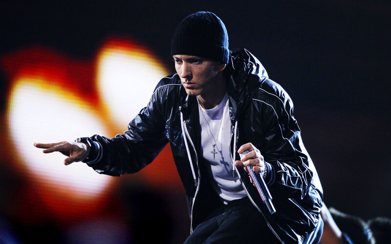 Man Performing on Stage — Black, Intense