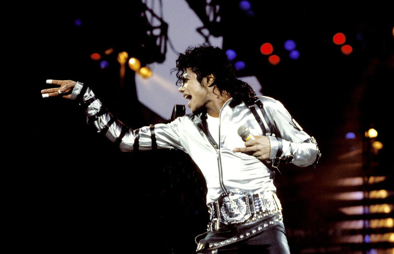 Man Performing on Stage — Black