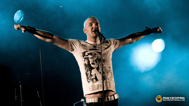 Man Performing on Stage — Blue, Dramatic