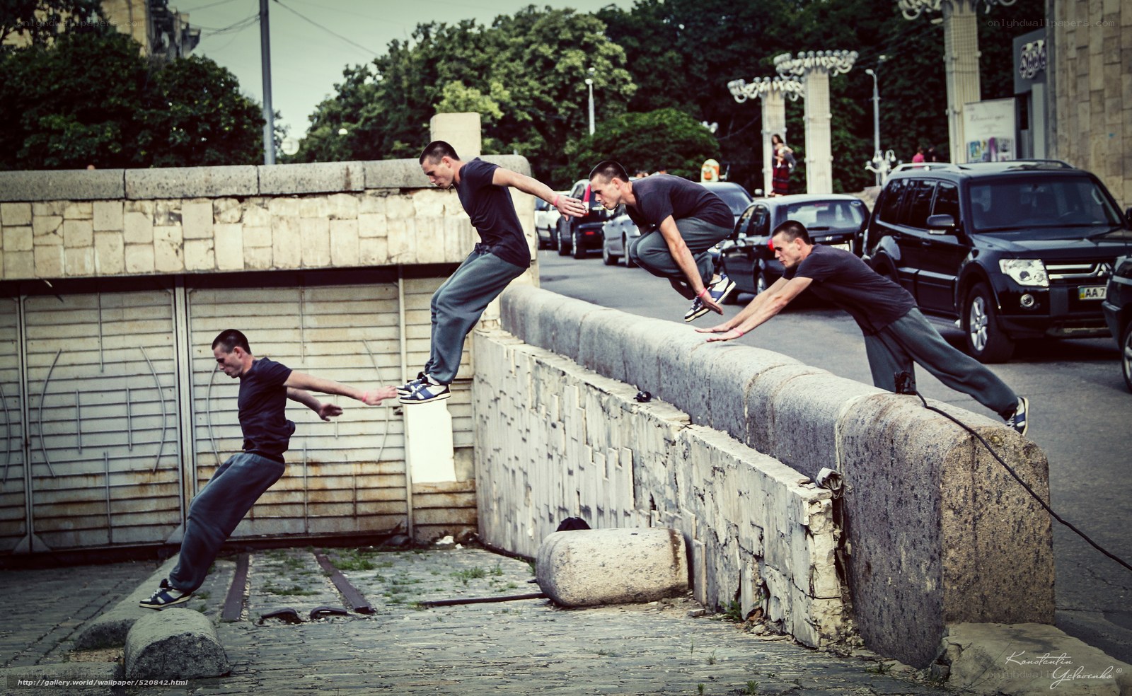 man performing parkour on wall
