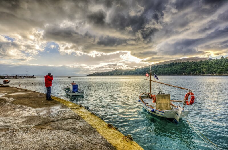 Man Photographing Boats