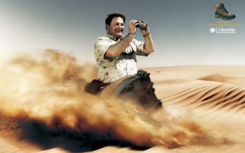 Man photographing in desert