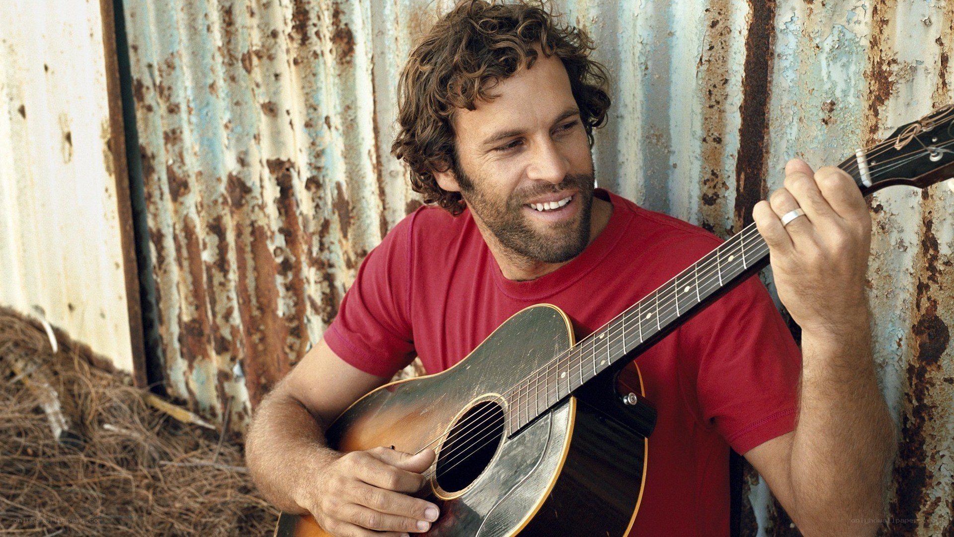 Man playing acoustic guitar