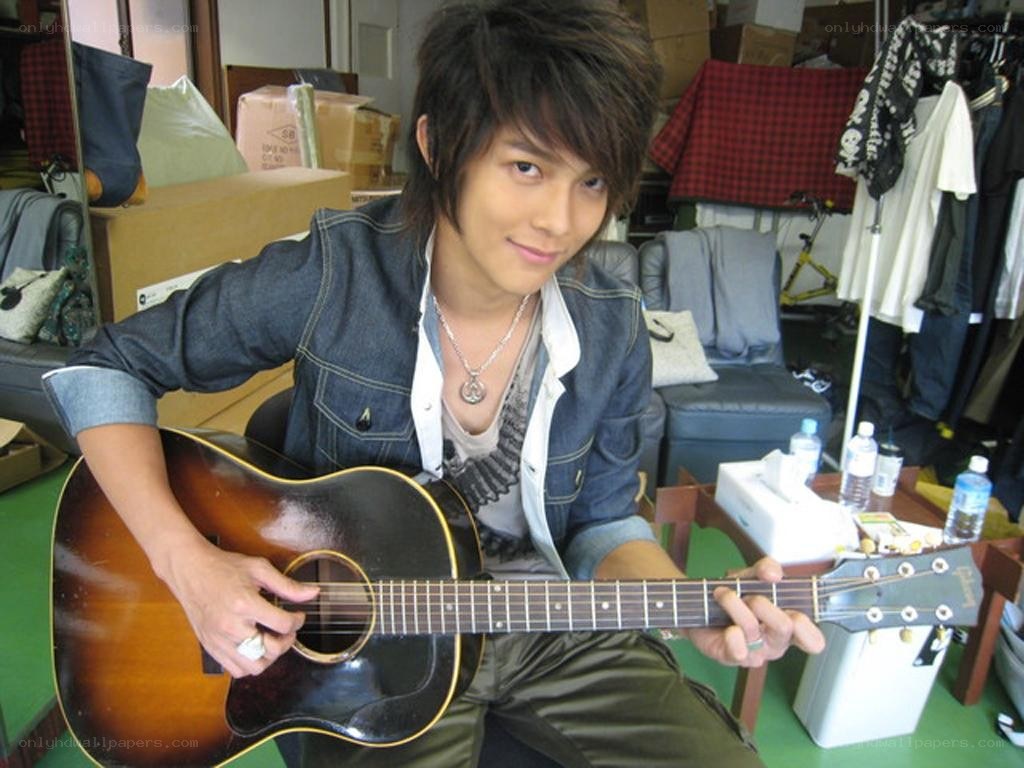 Man playing acoustic guitar