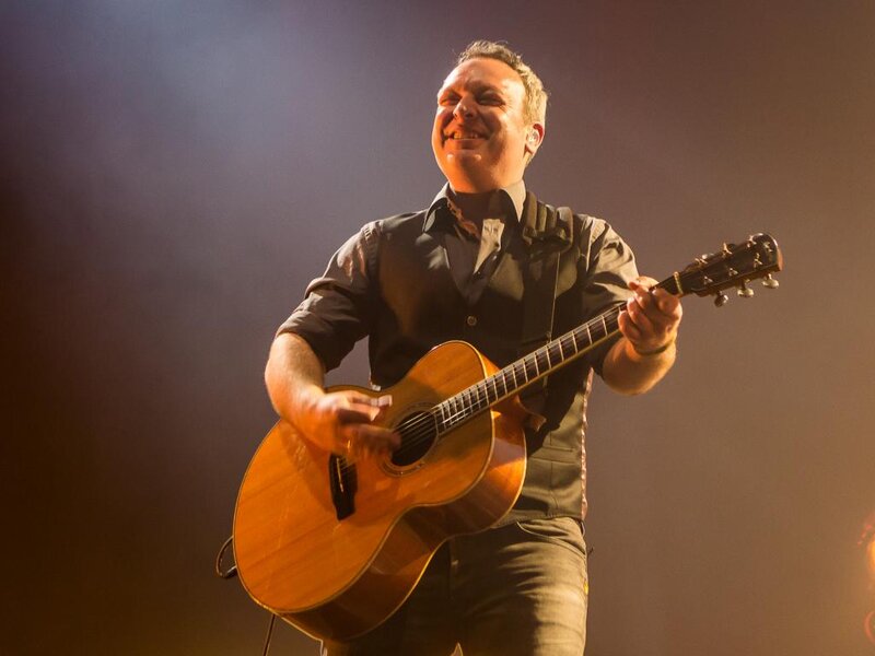 Man Playing Acoustic Guitar — Brown, Energetic