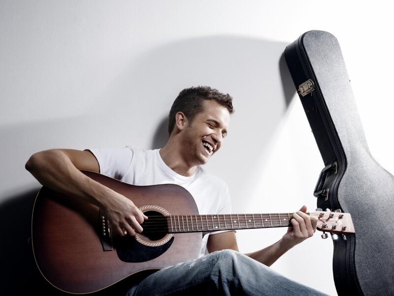 Man Playing Acoustic Guitar — Brown, Joyful