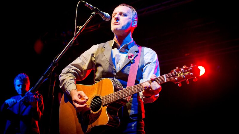 Man Playing Acoustic Guitar — Red, Dramatic