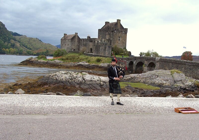 Man Playing Bagpipes — Gray