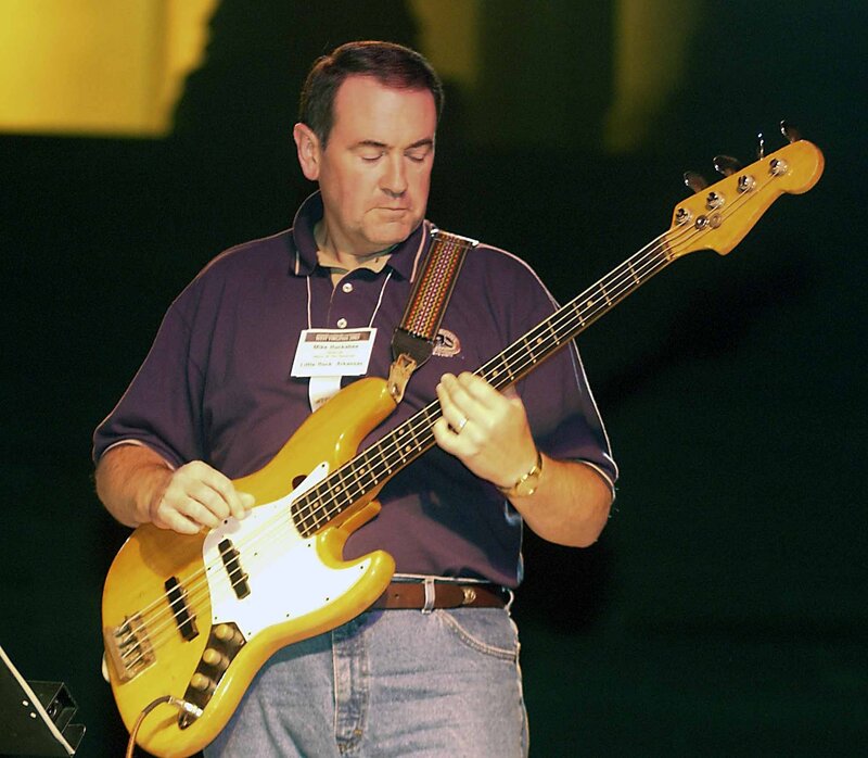 Man playing bass guitar on stage