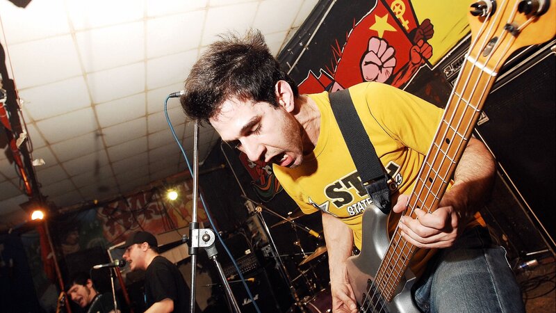 Man Playing Bass Guitar — Yellow, Energetic