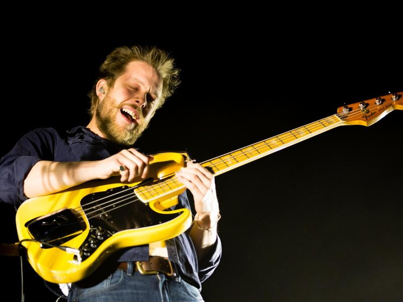Man Playing Bass Guitar — Yellow