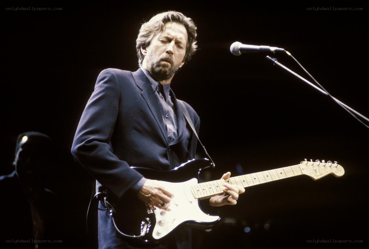 man playing electric guitar