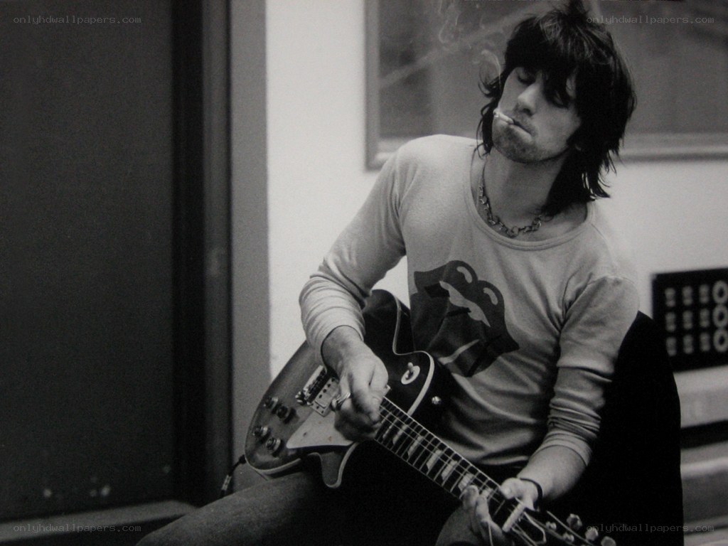 man playing electric guitar